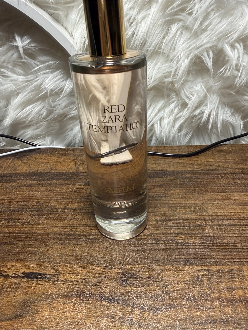 Fragrance Bottle on Wood Table